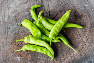 chili pepper on wood background