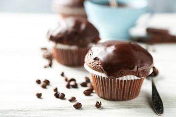 Tasty homemade chocolate muffins and cup of coffee