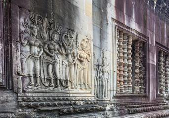 Fototapeta premium wall statue of God inside the Angkor Wat Temple