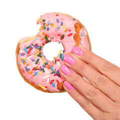 Bitten Donut with Sprinkles in Woman Hand isolated on white