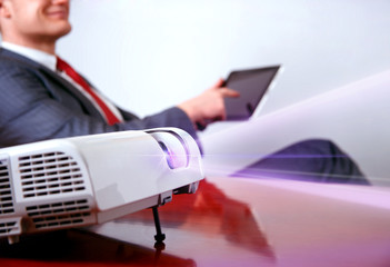 Businessman with projector