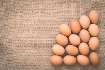 Eggs on old crumpled burlap