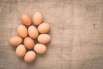 Eggs on old crumpled burlap