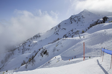Fototapeta na wymiar Mountain skitrack on the slope of Caucasus Mountains.