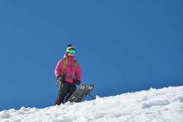 Naklejka na ściany i meble Woman skier in the soft snow