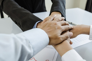 Business team hands on meeting desk