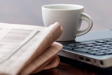 Newspaper and coffee