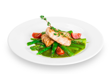 fish with asparagus on a white plate
