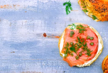 Fotobehang bagel  with a smoked salmon and cream cheese © zoryanchik
