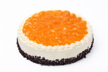 Cream cake with mandarins on white background
