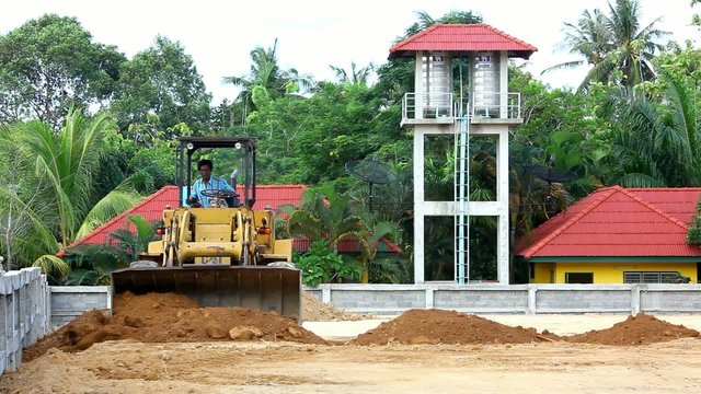 Earthmover dozer doing earthmoving works outdoors. Video