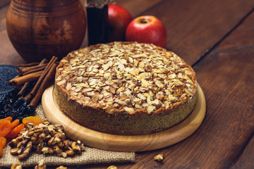 Homemade pie with poppy seeds and almond flakes
