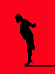 Silhouette of a woman close to fall down