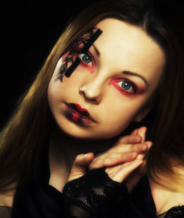 Fototapeta premium young woman with creative face-art