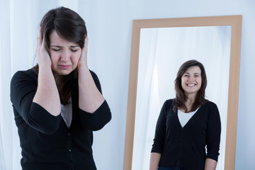 Woman and her reflection