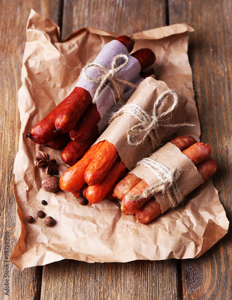 Poster Assortment of thin sausages, and spices