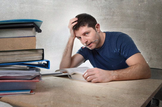 young stressed student studying exam in stress