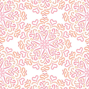 Elaborate circular ornament pattern in shades of pink