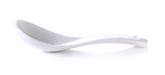 white ceramic spoon isolated on white background