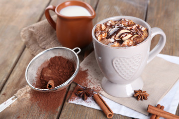 Cup of hot coffee with marshmallow and cup of milk with
