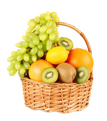 Assortment of fruits in basket isolated on white