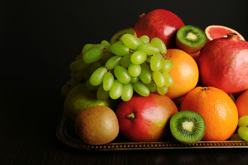 Assortment of fruits on table, close-up