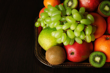 Assortment of fruits on table, close-up