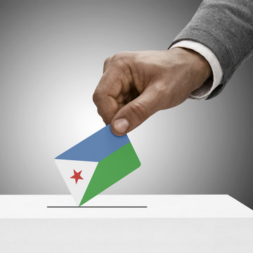 Black male holding flag. Voting concept - Djibouti