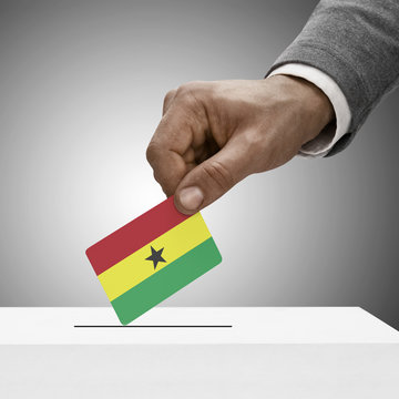 Black male holding flag. Voting concept - Ghana