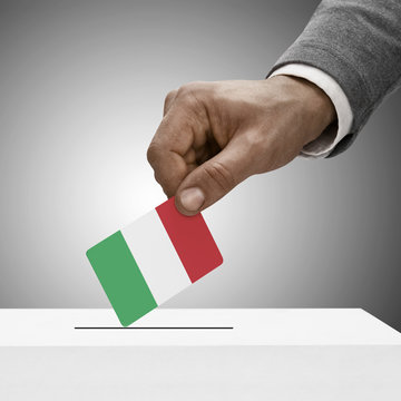 Black male holding flag. Voting concept - Italy
