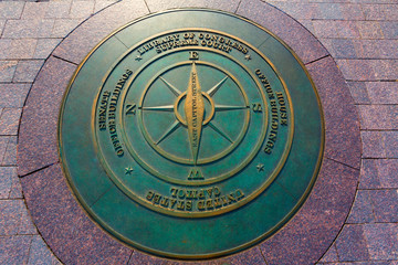 compass symbolic on washington DC ground
