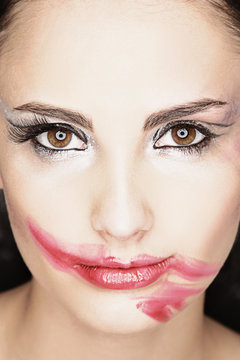 face smeared with lipstick