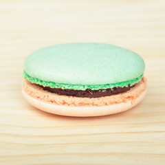 French Macaron on wooden background