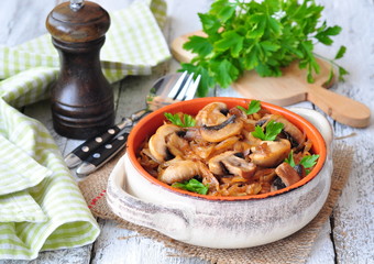 Vegetarian Stewed cabbage with mushrooms and tomato sauce