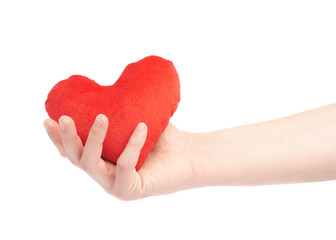 Fototapeta premium Gently holding plush red heart isolated