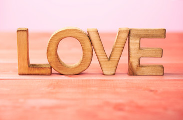 Love composition of wooden letters