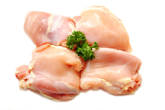 Raw Chicken Thighs with Fresh Parsley