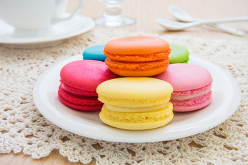 Colorful macarons on plate
