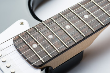 Guitar frets with strings