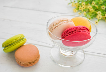 Colorful macarons in glass