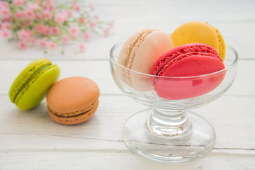 Colorful macarons in glass