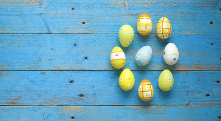 easter eggs on wooden background, free copy space