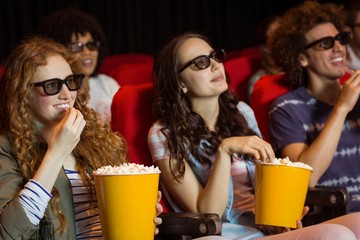 Young friends watching a 3d film