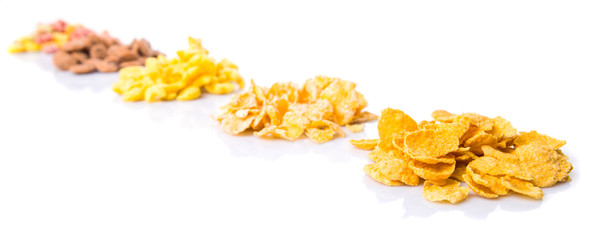 Mix variety of breakfast cereals over white background