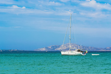 white boat alone in the sea