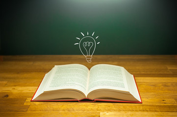 read book with light bulb ideea