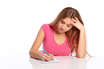 Young woman sitting behind the desk