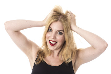 Fototapeta premium Model Released. Excited Young Woman Pulling Hair