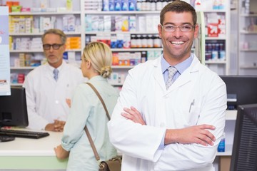 Fototapeta na wymiar Smiling pharmacist looking at camera