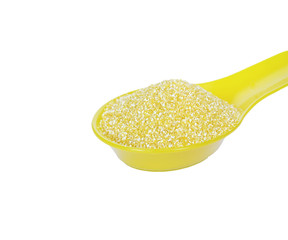 Corn grits in a spoon